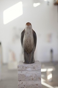Work: Jane Rosen Cash Bird on Ladder, 2017 hand blown pigmented glass and limestone 64 x 8 x 13 inchesfigure: 14 x 4.5 x 8 inchesbase: 50 x 8 x 13 inches ROSEN300