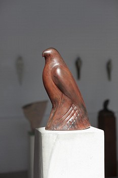 Jane Rosen - Rufous II, 2016 hand blown pigmented glass and limestone 66 x 8 x 10 inchesfigure: 14 x 6 x 8 inchesblock: 3.5 x 6 x 8 inchesbase: 48 x 8 x 10 inches ROSEN301